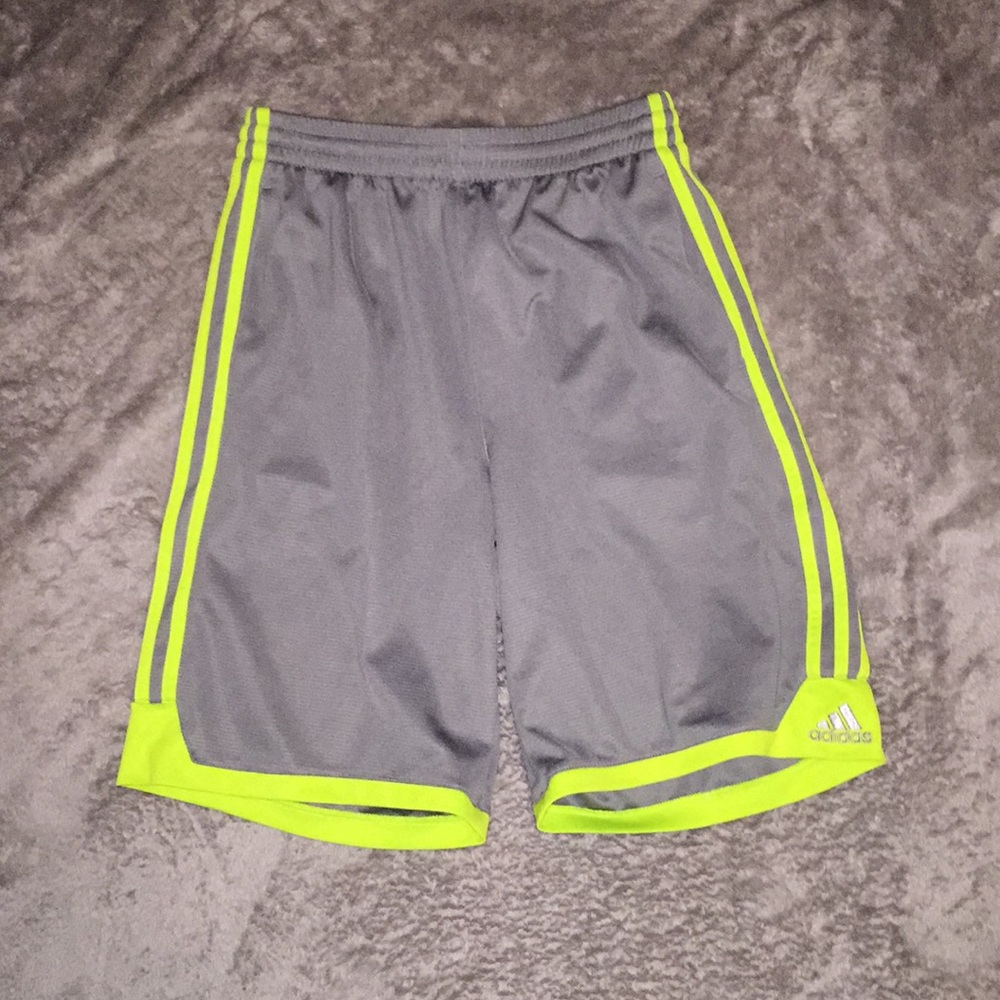 Gray and green adidas shorts